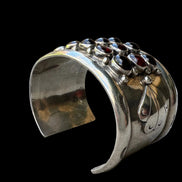Repoussé and Garnet Sterling Cuff by M. Guerro