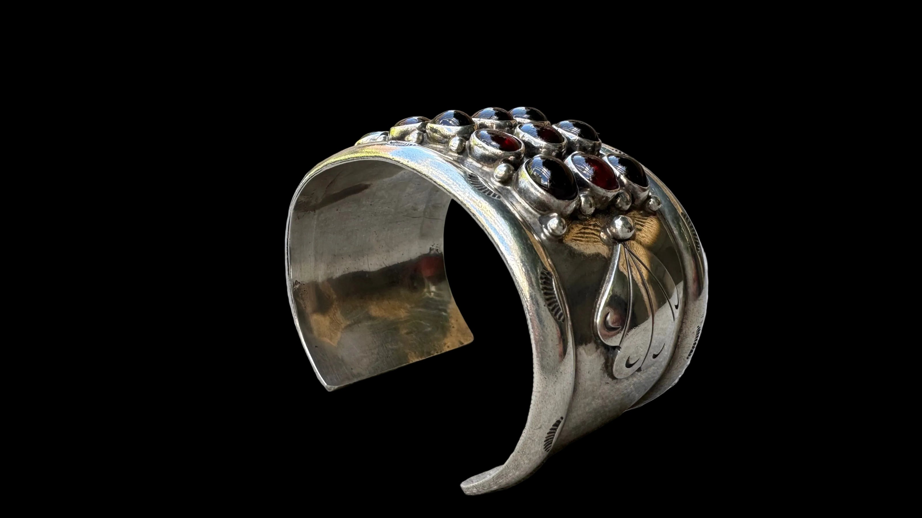 Repoussé and Garnet Sterling Cuff by M. Guerro