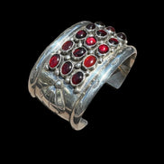 Repoussé and Garnet Sterling Cuff by M. Guerro
