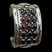 Repoussé and Garnet Sterling Cuff by M. Guerro