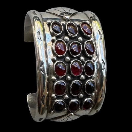 Repoussé and Garnet Sterling Cuff by M. Guerro